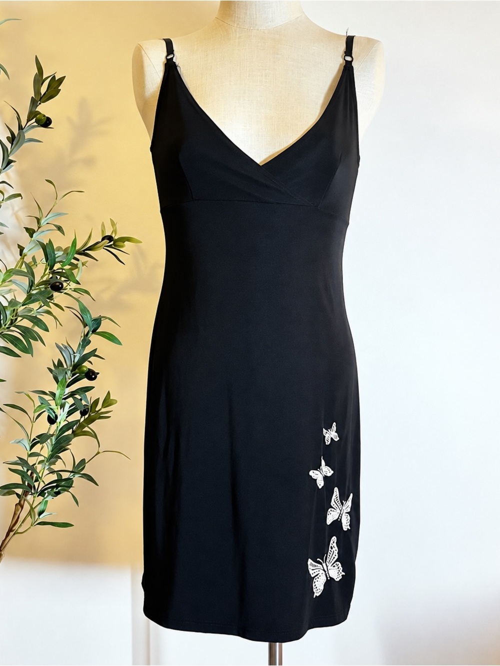Y2K Bombshell black mini dress with velvet butterfly’s